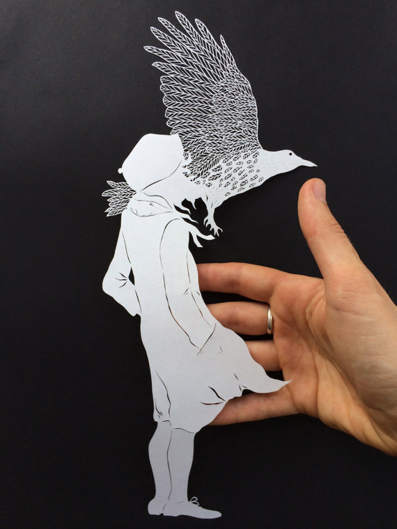 Папер арт. Человек и птица вырезанные из бумаги